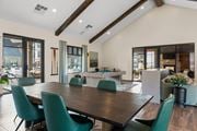 Colorado Springs apartment for rent - A modern meeting room with a large table and chairs.