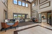 Colorado Springs apartment for rent - A dining room with a table set for two and a view of the backyard.