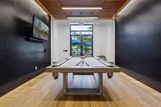 Waltham apartment for rent - a game room with a ping pong table and a window at The Merc, Waltham, Massachusetts
