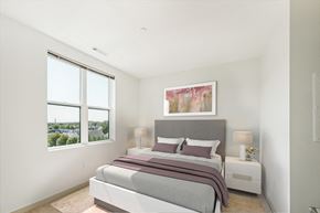 Waltham apartment for rent - a bedroom with a bed and two windows at The Merc, Waltham