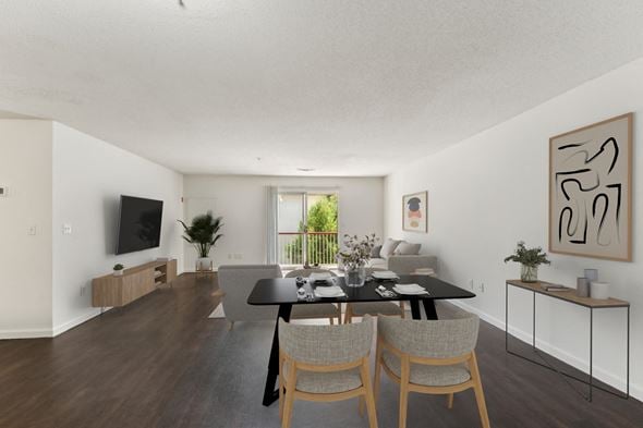 Westborough apartment for rent - a living room and dining room with a black table and chairs at Residences at Westborough Station, Westborough, MA, 01581