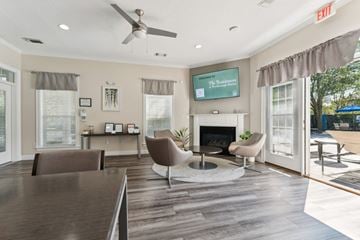 Westborough apartment for rent - a living room with a fireplace and a table and chairs