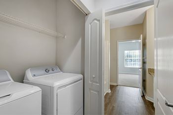 Laundry room with washers and dryers