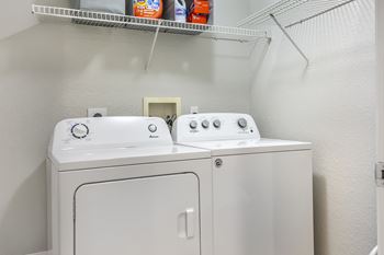 A white washing machine and dryer