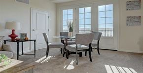 Lancaster apartment for rent - a dining room with a table and chairs