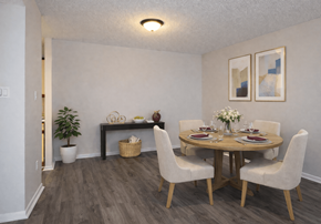 Topeka apartment for rent - A dining room with a round table and chairs.