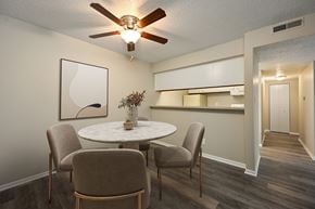 Topeka apartment for rent - A dining room with a white table and chairs.