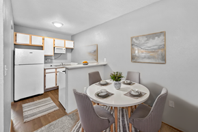 Lawrence apartment for rent - A kitchen with a dining table set for four.