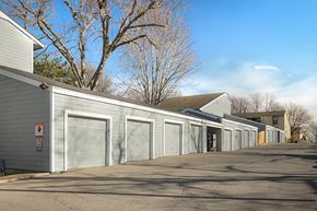 Topeka apartment for rent - A row of garage doors are closed.