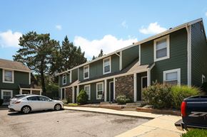 Lawrence apartment for rent - an apartment building with a car parked in front of it