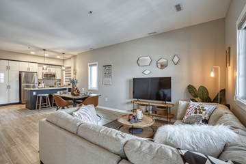 Winnipeg townhouse for rent - a living room with a couch and a tv