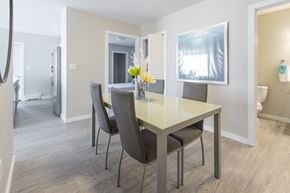 Regina apartment for rent - A dining room with a table and chairs.