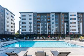 Edmonton apartment for rent - Exterior With Pool View at Cadence at Griesbach, Edmonton, AB, T5E 1Y8