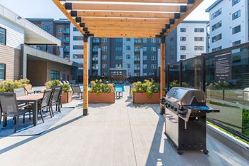 A patio with a grill
