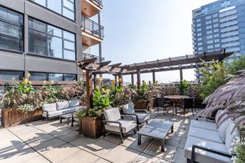 A patio with white furniture