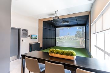 Calgary townhouse for rent - A modern dining room with a large table and chairs.