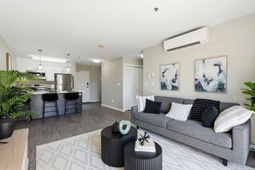 Winnipeg apartment for rent - A living room with a grey couch and a coffee table.