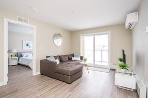 Regina apartment for rent - Interior - wide shot of living room and bedroom