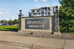 Regina apartment for rent - A sign that says Deveraux Heights in front of a building.