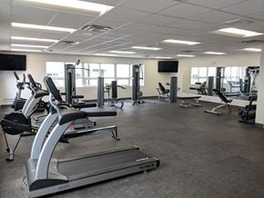 Winnipeg apartment for rent - Interior - wide shot of fitness centre