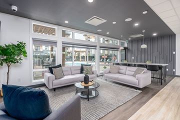 Sherwood Park apartment for rent - a living room with couches and a table