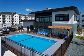 Winnipeg townhouse for rent - Exterior - wide shot of swimming pool and clubhouse