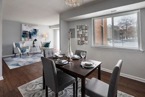 Lanham apartment for rent - a dining room with a table and chairs at The Glendale Residence, Lanham, MD