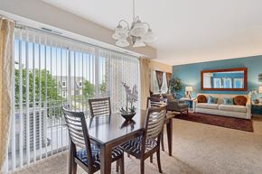 Suitland apartment for rent - a dining room with a table and chairs at Andrews Ridge Apartments, Suitland, MD