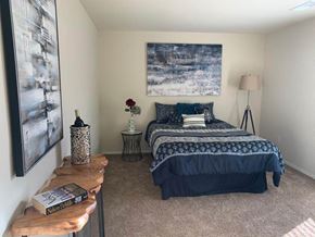 Lanham apartment for rent - a bedroom with a bed and a nightstand at The Glendale Residence, Lanham, MD, 20706