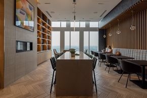 Nashville apartment for rent - a dining room with a table and chairs and a view of the ocean
