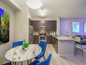 Daytona Beach apartment for rent - a kitchen and dining room with a table and chairs at Icon One, Florida, 32114