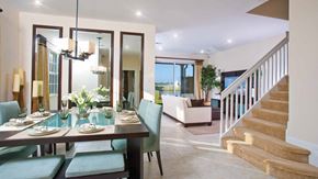 Hollywood condo for rent - A dining room with a table set for four with a view of the backyard.
