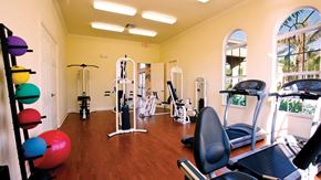 Hollywood condo for rent - A gym with a variety of equipment including treadmills, weights, and exercise machines.
