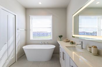 Bathroom with sink and bathtub