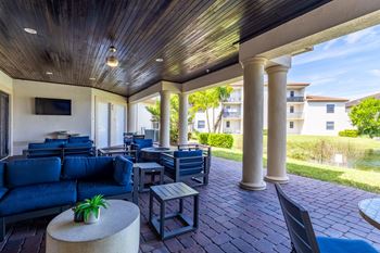 Patio with blue chairs