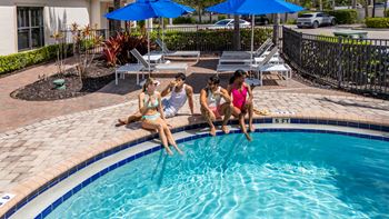 Three women sunbathing
