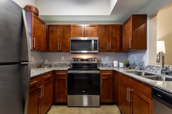 Kitchen with wooden cabinets