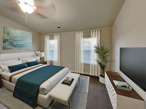 Charlotte apartment for rent - A bedroom with a large bed and a television.