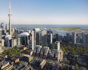 Toronto apartment for rent - A cityscape with a tall tower in the background.