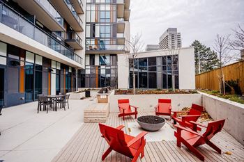 Fireplace with lounge seating and sun loungers (phase i & ii)