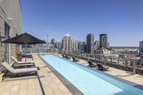 Toronto apartment for rent - the pool on the rooftop of a building with a view of the city