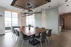 York apartment for rent - a conference room with a long wooden table and chairs