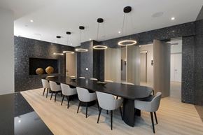 Toronto apartment for rent - A modern dining room with a black table and chairs.