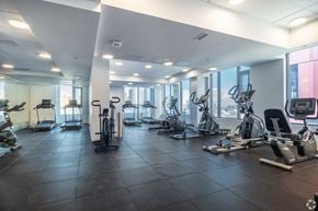 Ottawa apartment for rent - A spacious gym with a variety of exercise equipment.