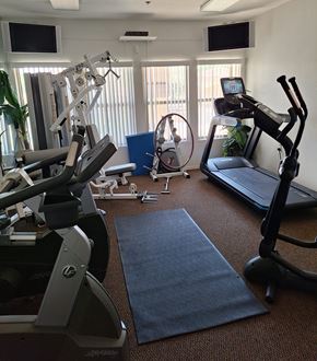 Sierra Vista apartment for rent - A gym with treadmills, elliptical machines, and other exercise equipment.