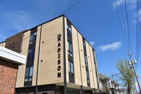 Cleveland apartment for rent - The Madison building has a beige facade with darker trim.