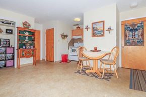 Jonesport apartment for rent - a dining room and kitchen with a table and chairs