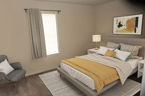 Newport News apartment for rent - a bedroom with a bed and a chair and a window