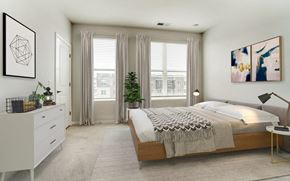 Columbus apartment for rent - a bedroom with a bed and two windows