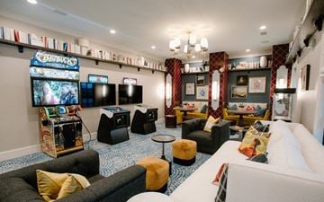 Columbus apartment for rent - a living room filled with furniture and a video game